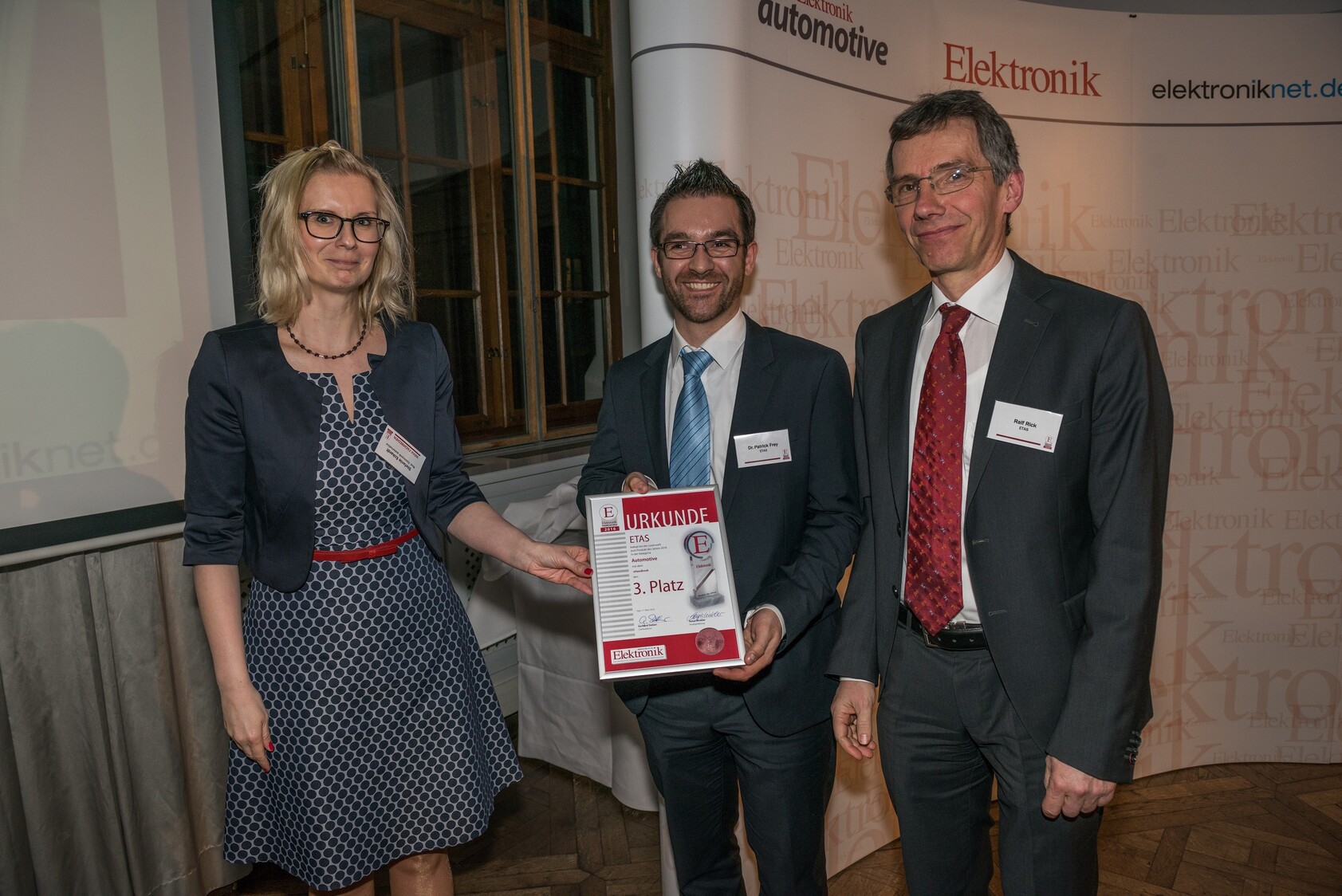 Me and my colleague Ralf Rick receiving the "Product-of-the-year-award" by Automotive Elektronik